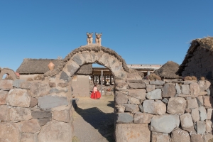 Peruvian family living in a small house next to Sillustani Peru