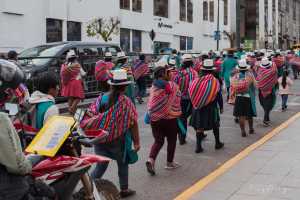 Labour demonstration by construction workers marching through the streets of Cusco Peru