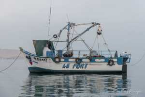 Fishing boat outside the Paracas village Peru