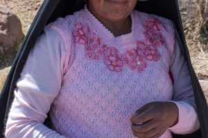 Indigenous Peruvian middle aged woman on the Island of Taquile in Lake Titicaca Peru