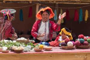 Indigenous Peruvian people in a small village in the Sacred Valley. The community is processing wool to yarn and yarn to fabric, 4 of 7